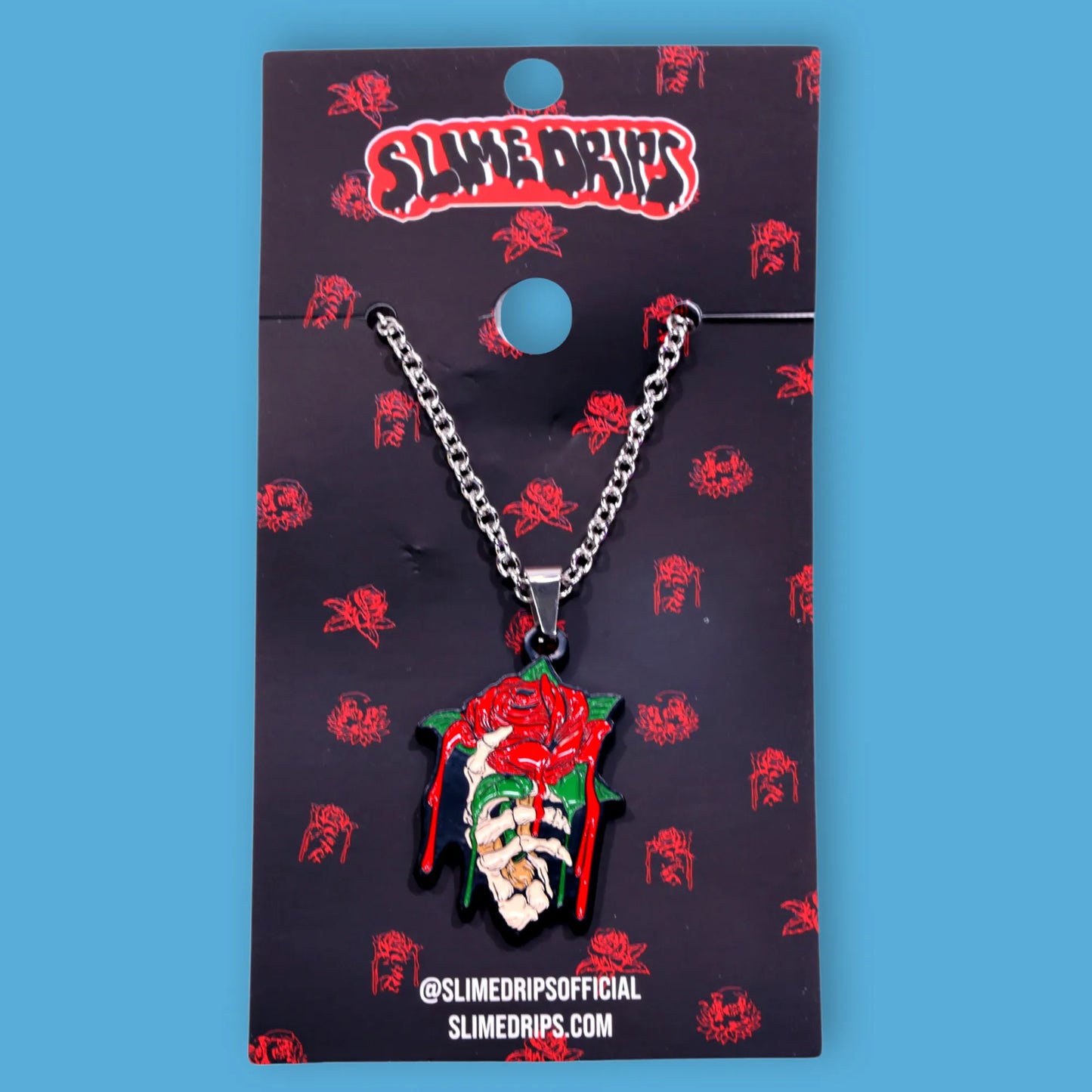 Rose with skeleton hand Necklace