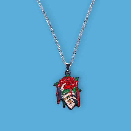 Rose with skeleton hand Necklace